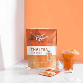 Prince Of Peace Thai tea sachets and cup showcase convenient office or travel use.