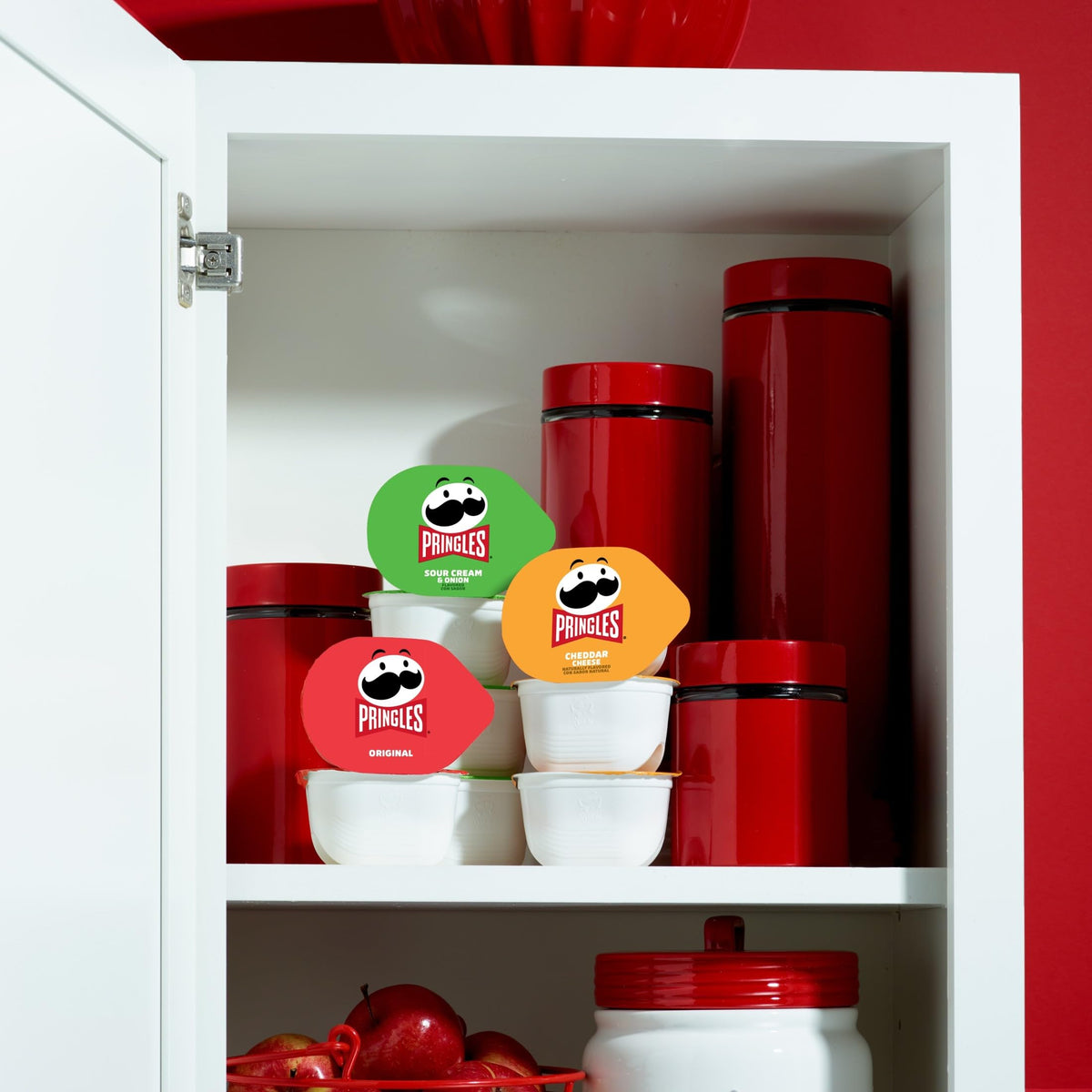 Original Pringles cup close-up, crisp texture for fast bites.