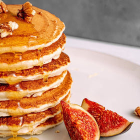 ProDough light fluffy pancakes plated with fruit topping