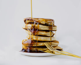 ProDough waffle batter in waffle maker turning golden brown