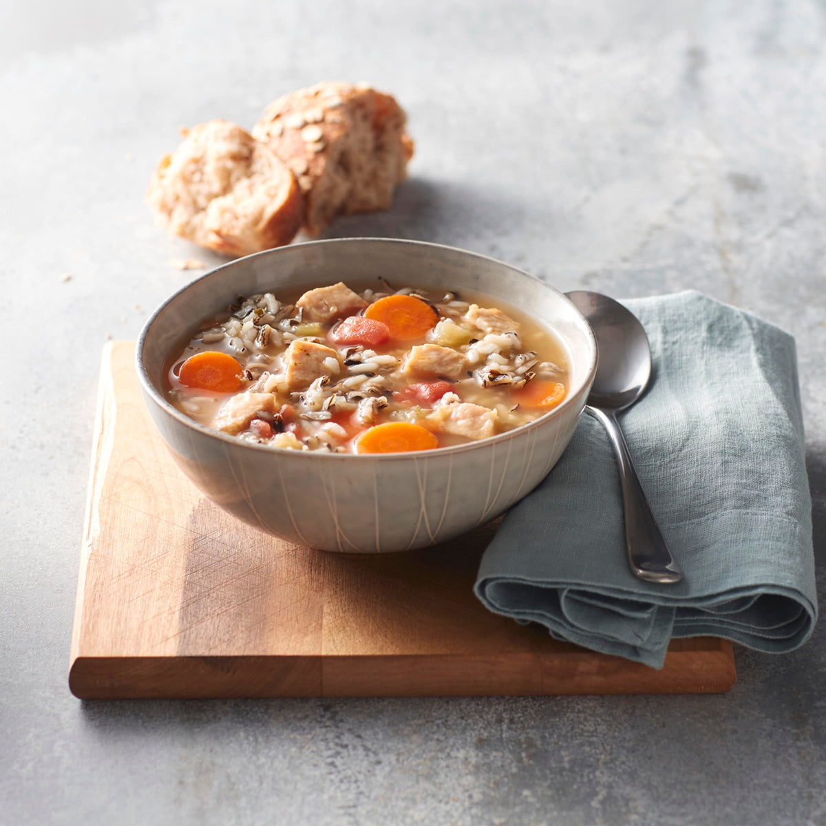Progresso soup served beside a toasted sandwich, a satisfying pairing