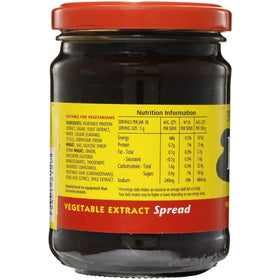Promite Spread beside crackers during snack setup emphasizing versatility.