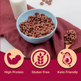 Pouring ProtiDIET chocolate soy cereal into milk for a quick meal.