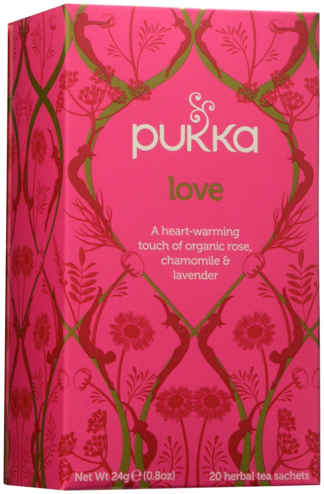 Pukka Love tea bag resting in a mug, inviting a soothing floral ritual.