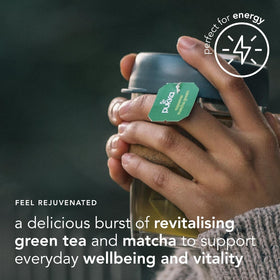 Pukka matcha powder in a cup showing emerald color and vitality.