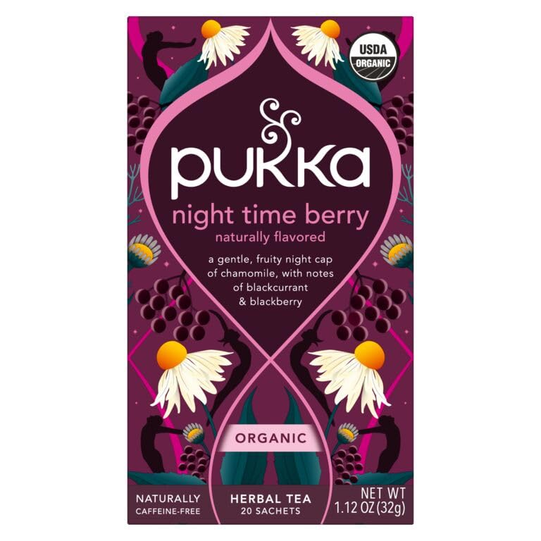Pukka Night Time Berry brew in a cup, caffeine-free evening infusion.