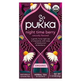 Pukka Night Time Berry brew in a cup, caffeine-free evening infusion.