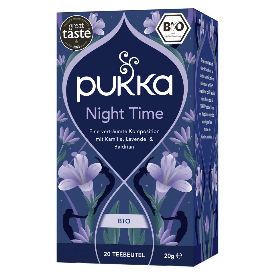 Pukka Night Time tea bag in cup, calming aroma for a peaceful evening.
