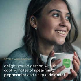 Pukka Three Mint tea bags brewed cup releasing soothing aroma after steeping