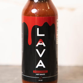 PUP AND THE PEPPER Lava Sauce small-batch kitchen setting.
