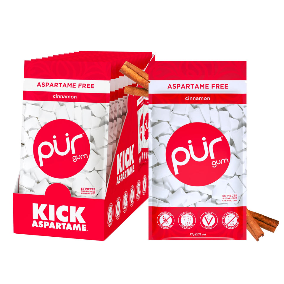 Pur Gum Cinnamon packaging front highlights the brand and sugar-free, xylitol-based formula.