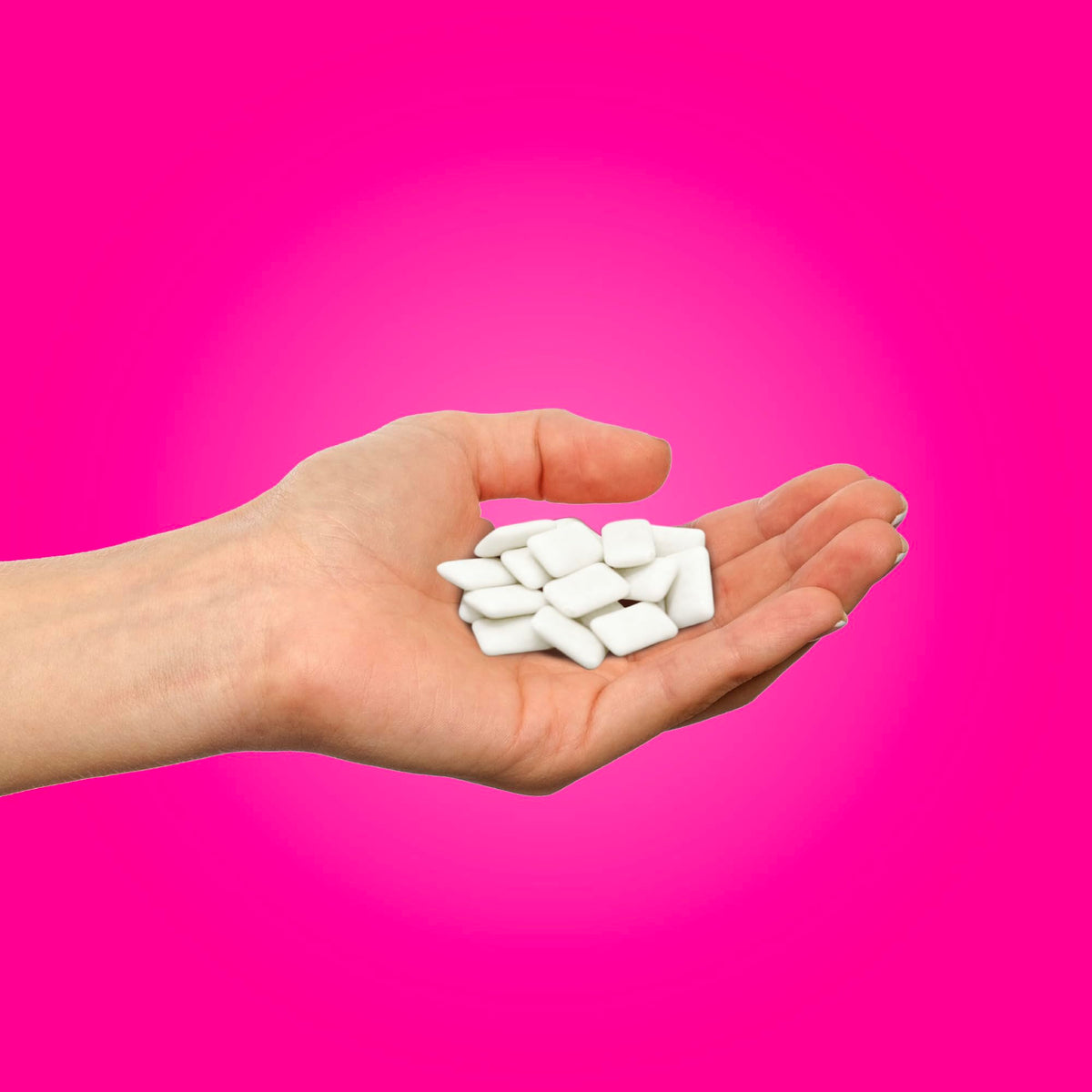 PUR Gum Pomegranate Mint gum piece close-up with xylitol-sweetened flavor and fruitiness