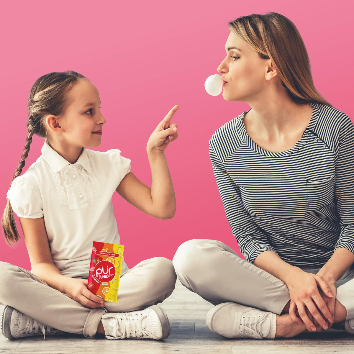 PUR Jumbo Gum orange piece delivers citrus zing.