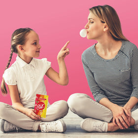 PUR Jumbo Gum orange piece delivers citrus zing.
