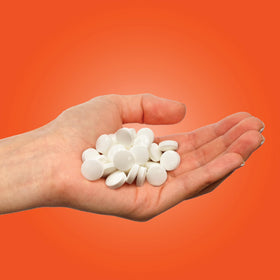 PUR Mints Tangerine Tango packaging on shelf highlights vegan, gluten-free, and keto-friendly options.