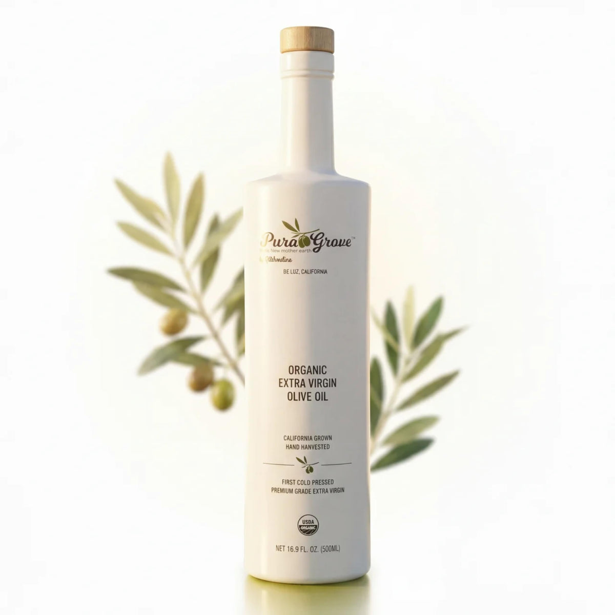 Pura Grove olive oil bottle close-up highlighting premium packaging that preserves freshness.