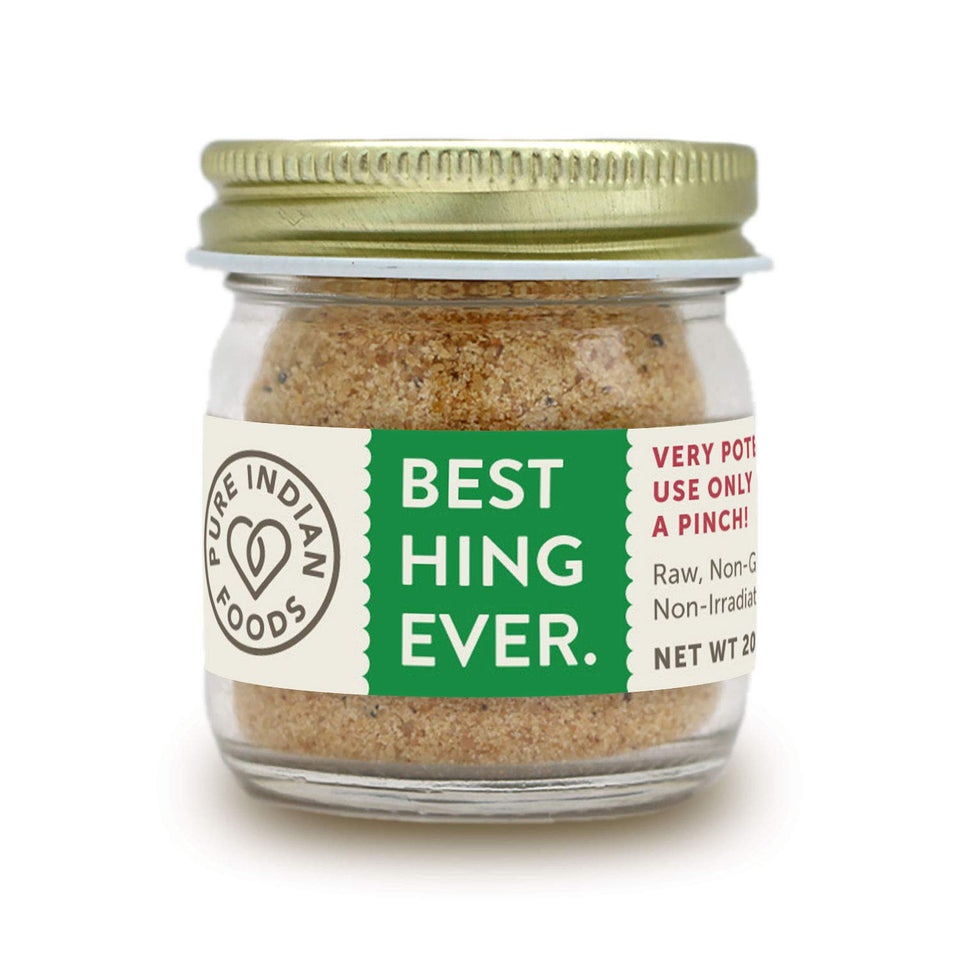 Pure Indian Foods Hing Ever asafoetida powder bottle highlighting its aroma.