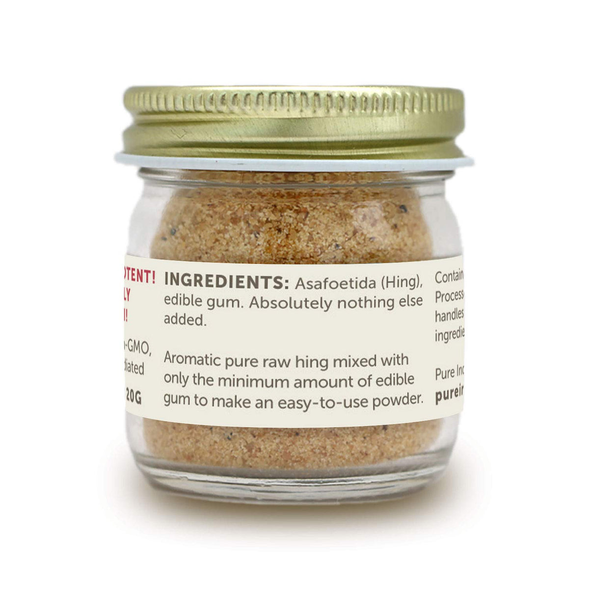 Hing Ever asafoetida powder jar close-up in glass packaging.