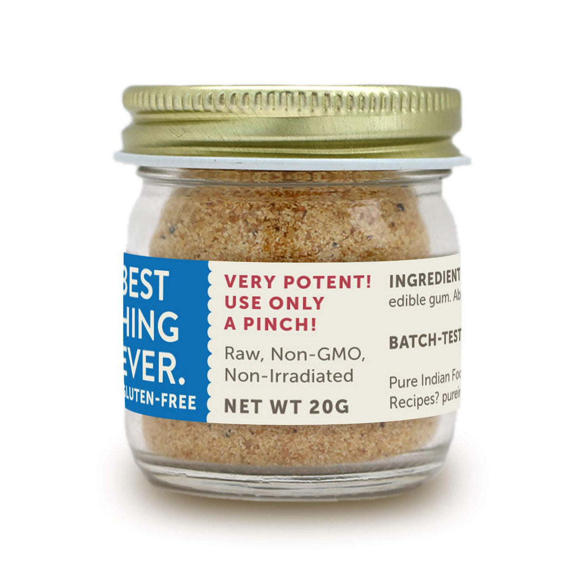 Pure Indian Foods Hing powder close-up releasing aroma for savory meals.