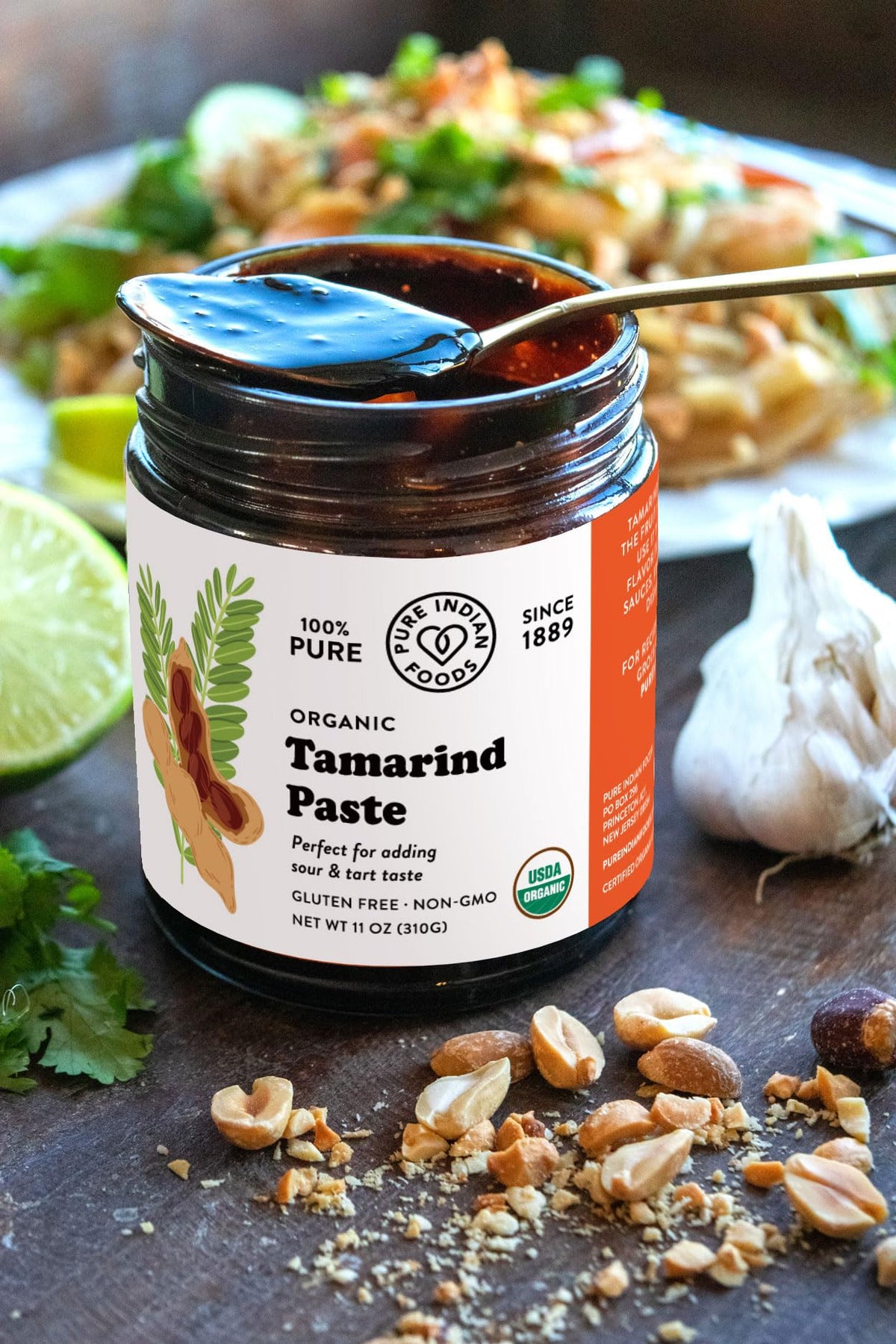 Amber tamarind paste texture from Pure Indian Foods, ready for vibrant sauces.
