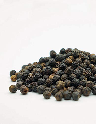 Pure Indian Foods Tellicherry peppercorns in a bag, ready for fresh grinding at home.