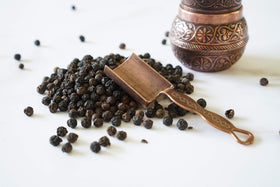Pure Indian Foods Tellicherry peppercorns ground spice for fresh sauces and rubs.