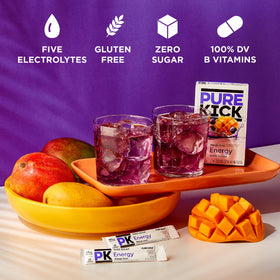 Pure Kick dissolving in water to create a refreshing zero-sugar drink.