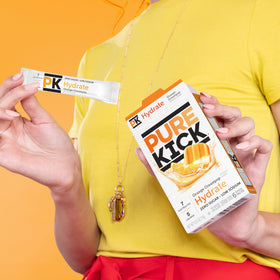Pure Kick Hydration Orange Creampop in gym bag for quick workouts