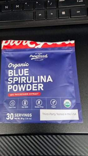 PureGood blue spirulina jar dispense highlights convenient home colorant