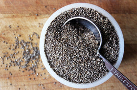 Pure Living chia seeds sprinkled on yogurt bowl for texture and nourishment.