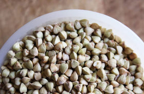 Pureliving sprouted buckwheat seeds close-up, ready to soak for nutrient-rich sprouting.