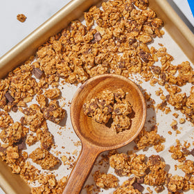 Purely Elizabeth cookie granola chocolate chip 11oz bag nutrition panel highlights fiber and sugar info.