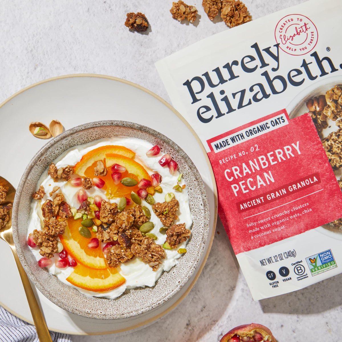 Purely Elizabeth Cranberry Pecan Granola ancient grains spread with quinoa and chia for texture