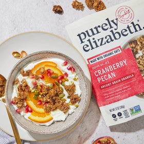Purely Elizabeth Cranberry Pecan Granola ancient grains spread with quinoa and chia for texture