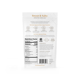 Purely Sprouted Sweet & Salty bag close-up, sprouted texture and colorful ingredients.