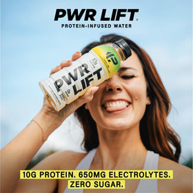 PWR LIFT Orange Mango whey-water pour during a workout