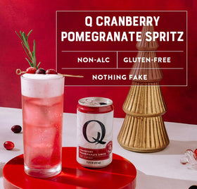 Q Mixers Cranberry-Pomegranate Spritz ingredients close-up highlighting real fruit notes.