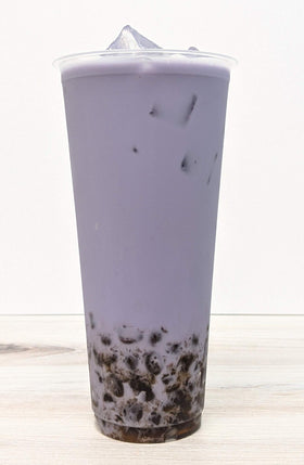 Qbubble taro powder prepared bubble tea, showcasing vibrant color and creamy texture
