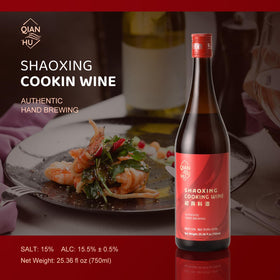 Qian Hu Shaoxing Wine 750ml bottle on the kitchen counter for easy cooking.
