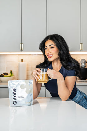 Qitone Keto Coffee Creamer cup with hot beverage and creamy texture