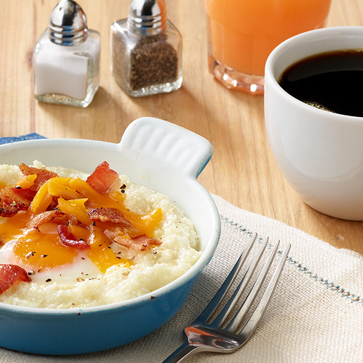 Quaker Instant Grits Cheddar Cheese packets for rich cheddar flavor