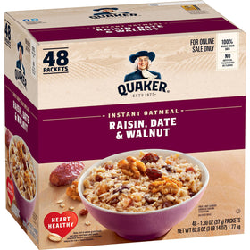 Quaker instant oatmeal bowl with raisins, dates and walnuts being poured for a quick, fiber-rich breakfast.