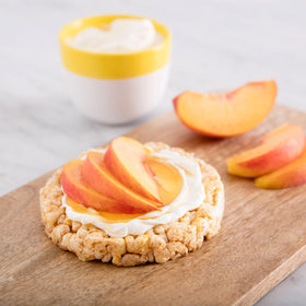 Close-up of Quaker caramel rice cakes, showing crispy baked texture.