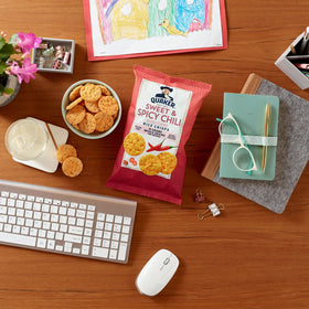 Quaker Rice Crisps Cheddar bag showcasing classic crunchy snack
