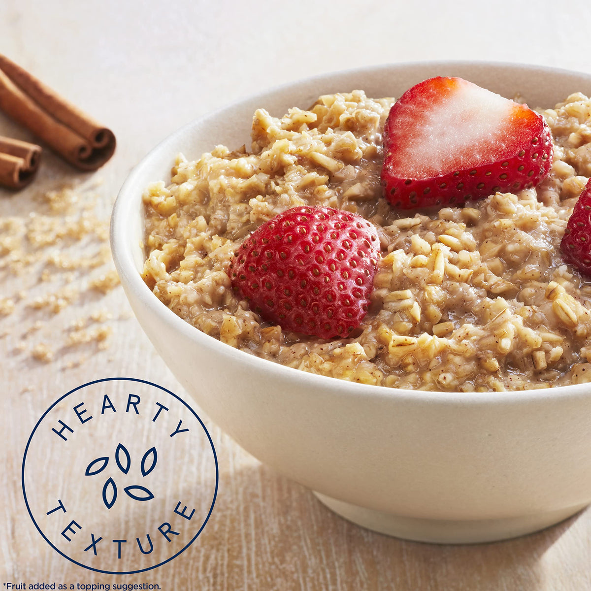 Quaker oatmeal with a spoonful of oats, ready in minutes for busy mornings.