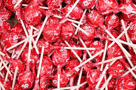 QUEEN CITY CANDY CAVE all-red cherry lollipops ready to hand out