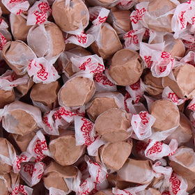 QUEEN CITY CANDY CAVE creamy chocolate saltwater taffy pieces wrapped for freshness.