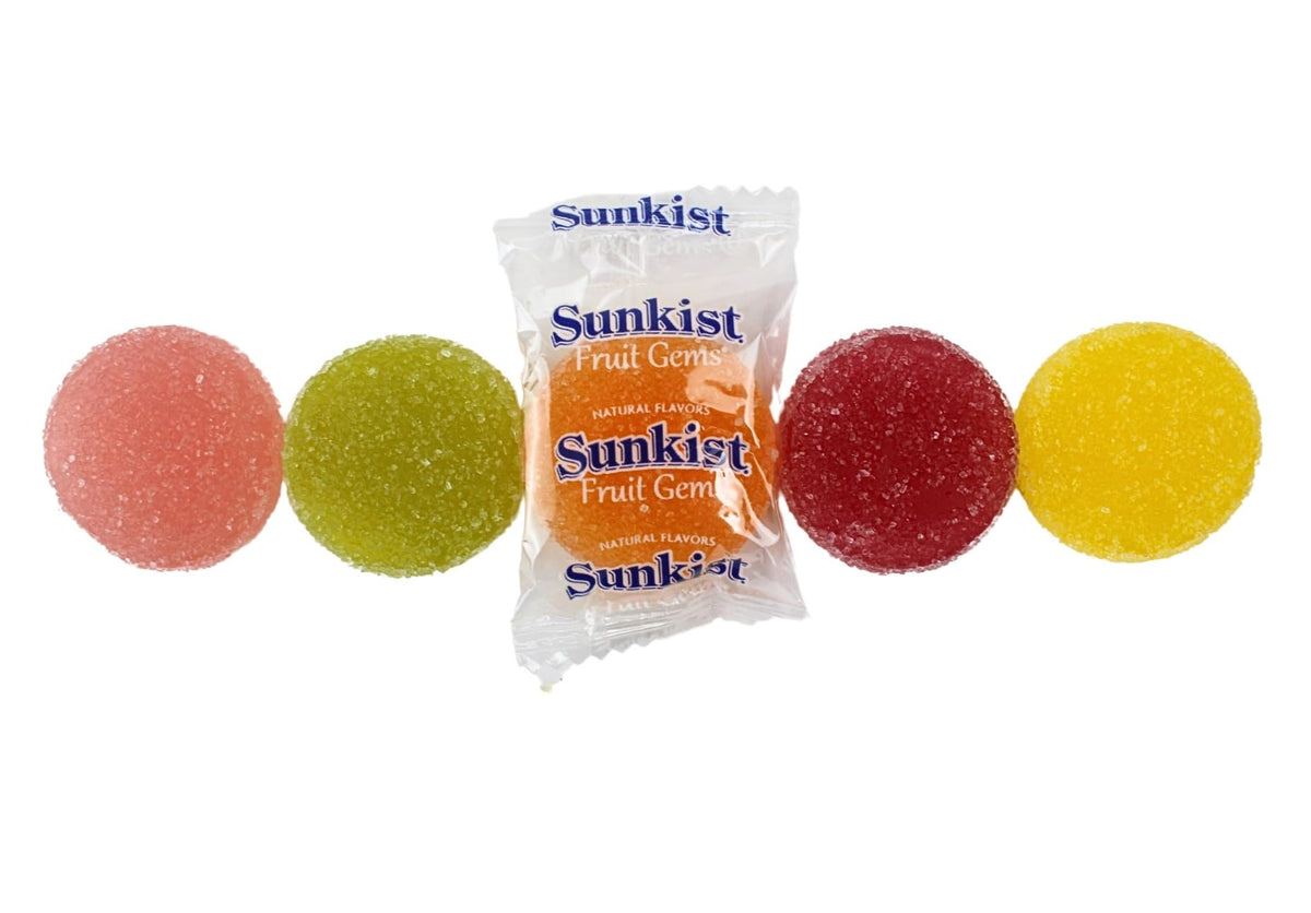 Queen City Candy Cave fruit slice flavors including orange, lemon, lime for bright bites