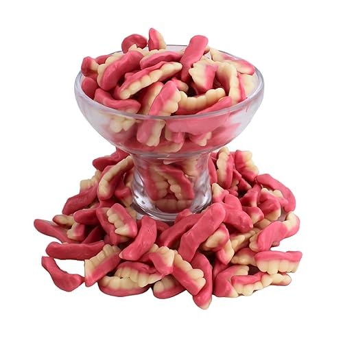 Queen City Candy Cave Fruity Edible Gummy Teeth spilling from a candy dish at movie night
