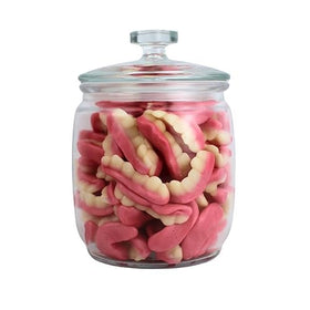 Queen City Candy Cave Fruity Edible Gummy Teeth on display with pink gums and white chompers